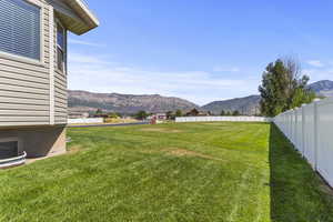 View of yard with a mountain view