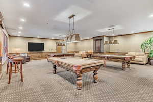 Rec room with billiards, carpet floors, wallpapered walls, ornamental molding, and recessed lighting