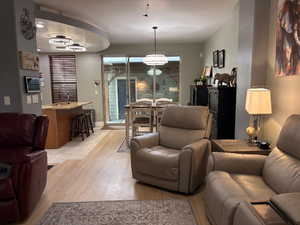 Living area featuring light wood-style flooring