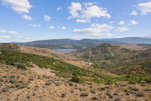 View of mountain background with a large body of water