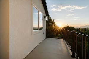 View of balcony at dusk