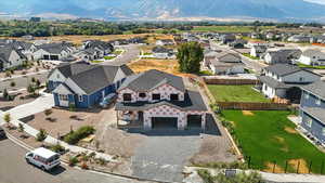 Aerial perspective of suburban area with a mountain backdrop