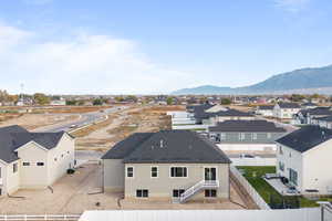 Aerial perspective of suburban area with mountains