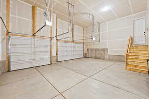 Garage featuring a garage door opener