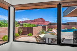 Doorway to outside with a mountain view