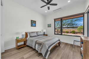 Bedroom featuring light wood-type flooring, recessed lighting, and ceiling fan