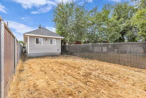 View of fenced backyard
