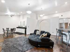 Great Room with Kitchen, Lounge Area and a larger Dining Area with a wet bar and Fridge.