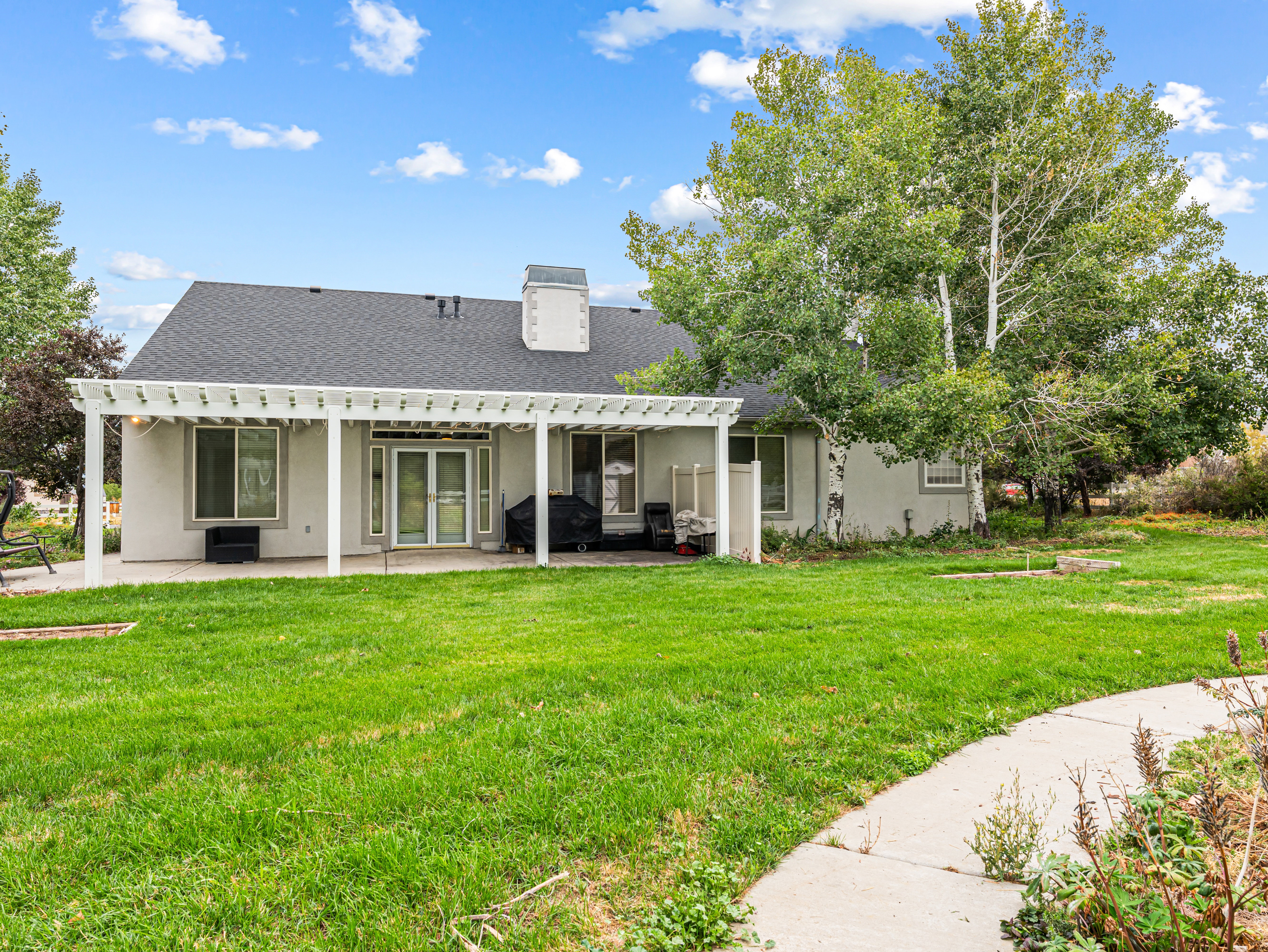 Rear view of the home and back patio.