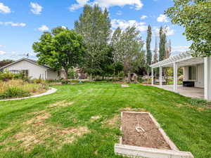 Backyard View with 2nd Patio for entertaining. Horshoe Pits, Shed and 2nd detached Garage
