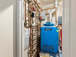 Utility room with Boiler system for Radiant Heat and Water. Has a manifold system for plumbing.