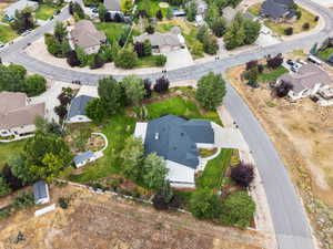 Aerial view of property's location featuring nearby suburban area