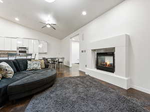 Great Room lounge area with a cozy double-sided fireplace, l