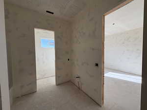 Bathroom with a textured ceiling
