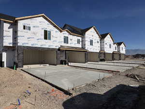 Property in mid-construction with a residential view