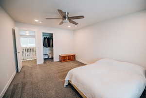 Bedroom featuring carpet floors, ceiling fan, and recessed lighting