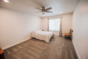 Bedroom featuring carpet floors, ceiling fan, and recessed lighting