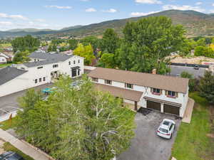 View from above of property featuring a mountainous background