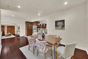 Open concept kitchen/dining with 9 ft ceilings.