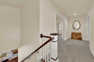 Stairs to second level after family room