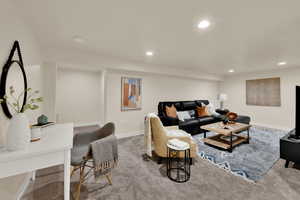 Stairs to basement family room after dining area