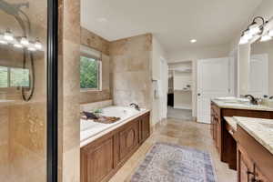 Full bathroom 2 - primary ensuite with view of adjacent walk-in-closet