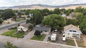 Aerial view of residential area featuring mountains