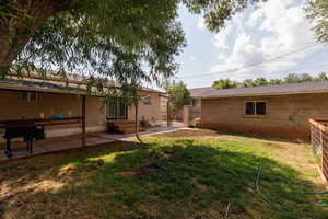 View of yard featuring a patio
