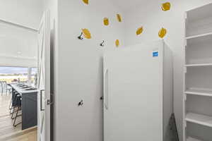 Bathroom featuring light wood-type flooring