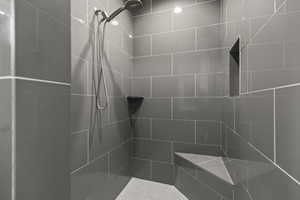 Bathroom with tiled shower