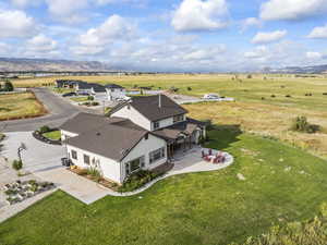 Aerial view of sparsely populated area with a mountainous background
