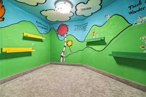 Game room with carpet flooring and baseboards