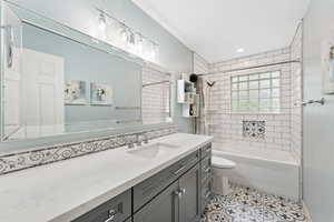 Full bathroom with vanity, shower / bathtub combination with curtain, light tile patterned floors, and recessed lighting