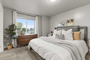 Master Bedroom with carpet floors
