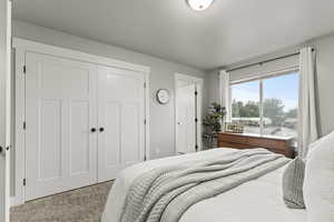 Master bedroom featuring a closet