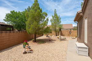 View of fenced backyard