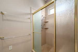 Bathroom featuring a stall shower