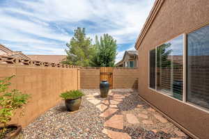View of fenced backyard