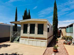 View of front of property featuring a patio area