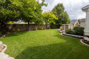 View of fenced backyard