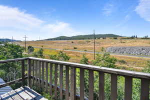 Balcony featuring a view of rural / pastoral area