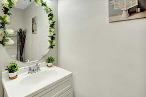 Bathroom with vanity and toilet