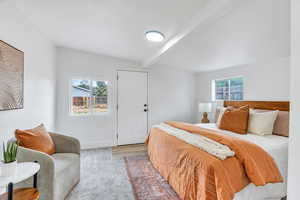 Large bedroom with patio access