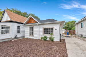 View of front of property featuring roof with shingles