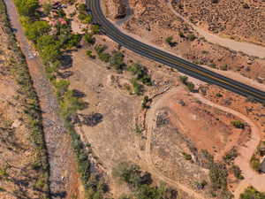Aerial view of property and surrounding area featuring rural landscape
