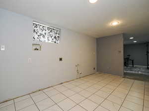 Unfurnished room with a textured ceiling and recessed lighting