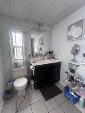 Bathroom featuring vanity and light tile patterned floors