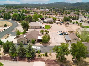 Aerial view of residential area featuring a mountainous background