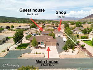 Aerial view of residential area with mountains