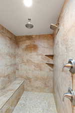 Full bath with tiled shower
